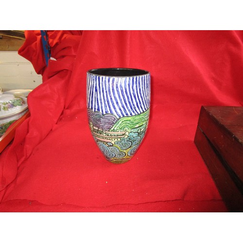 70 - A hand thrown vase by master potter Alan White and painted by Tony Morris. 
The vase shows a stylise... 