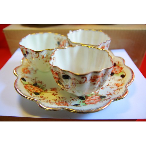 62 - An antique Imari-style tea service