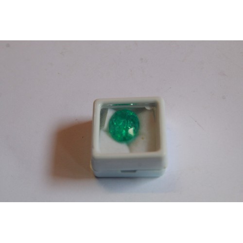 127 - A 10.22ct oval cut Emerald with a Certificate of Authenticity