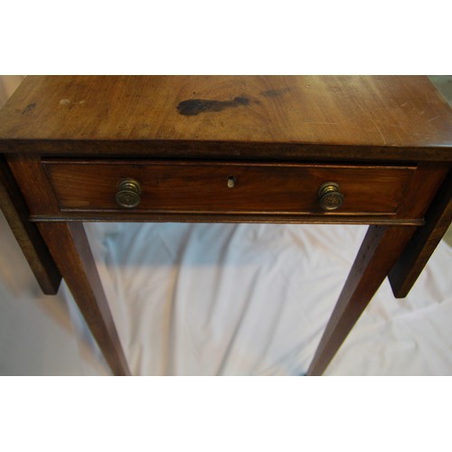 114 - An antique Pembroke table on original castors