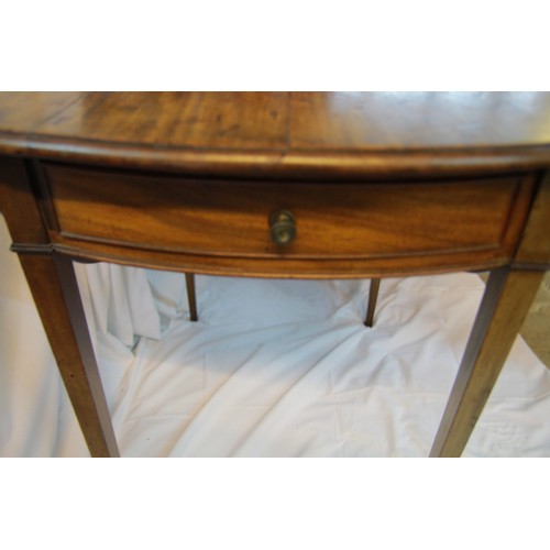 115 - An antique Pembroke table