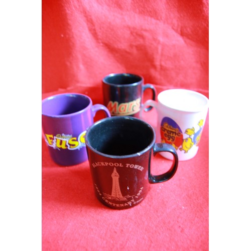 73 - A box of assorted advertising mugs