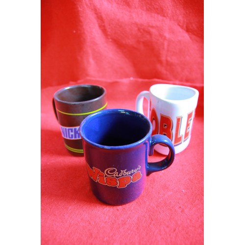 73 - A box of assorted advertising mugs