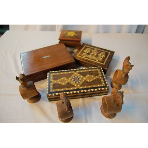 277 - 4 treen boxes and a set of 4 carved treen animal figure napkin rings