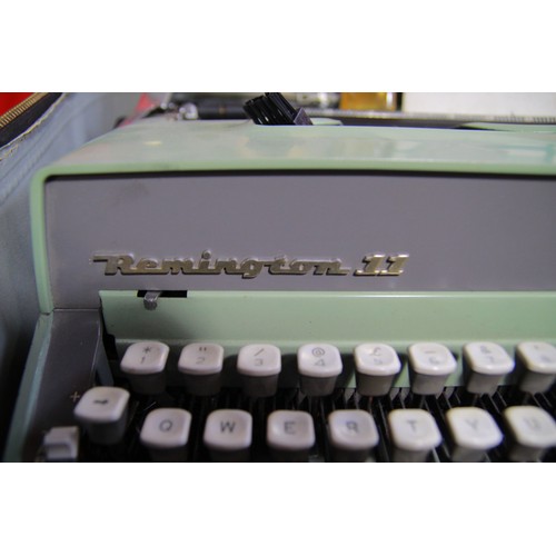 107 - A 1960s vintage cased Remington 11 typewriter in working order with original instruction booklet, ca... 