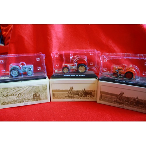 250 - x8 boxed and mint Atlas Editions tractors