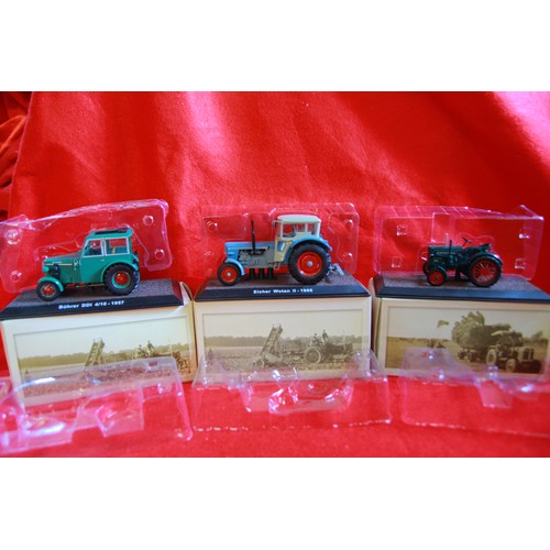 251 - x11 boxed and mint Atlas Editions die-cast tractors