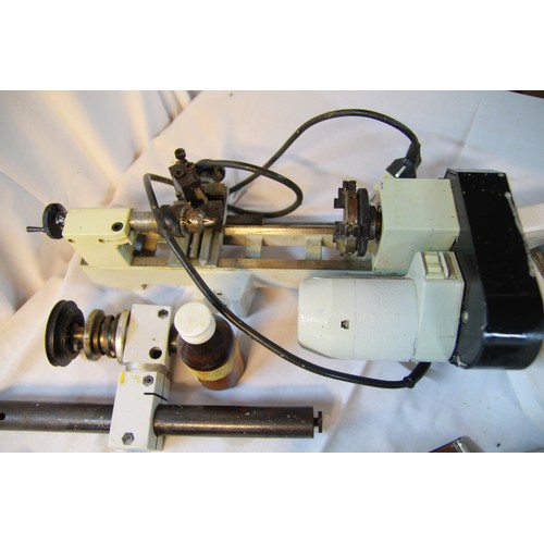 225 - An Emco Unimat 3 desktop lathe plus several boxes of tools, cutting bits and accessories, many boxed... 