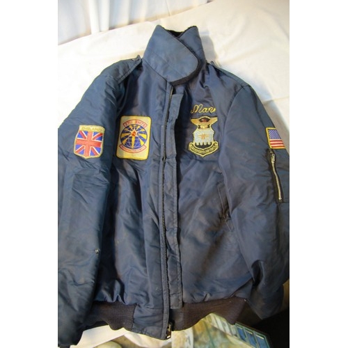 153 - A vintage USAF Green Fatigue Jacket with Airmen 1st Class stripes and Air Force Communications Comma... 