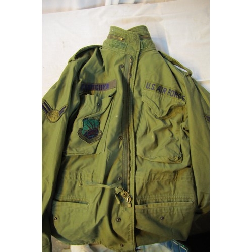 153 - A vintage USAF Green Fatigue Jacket with Airmen 1st Class stripes and Air Force Communications Comma... 