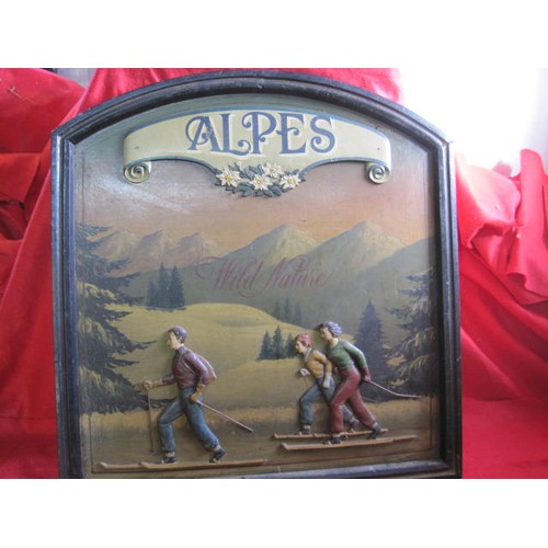 276 - A vintage painted wooden 'Alpes' sign with skiers in relief