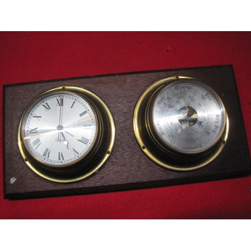 140 - A bulkhead-style brass cased quartz clock and a matching brass cased Weathermaster barometer both mo... 