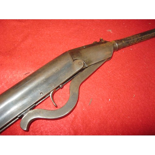 145 - An antique air rifle in .22 calibre, part octagonal barrel, break action, believed to be Belgian, wo... 