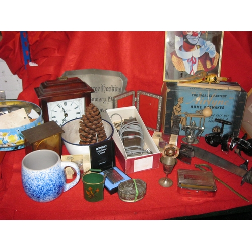 193 - A mixed lot of various interesting items including a large knife, fishing reels, a cased Ronson ligh... 