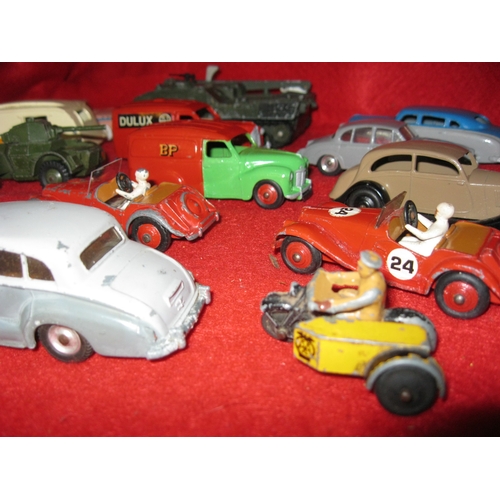 267 - A selection of 17 Dinky Toys die cast cars, vans and military vehicles, some repainted, most in good... 