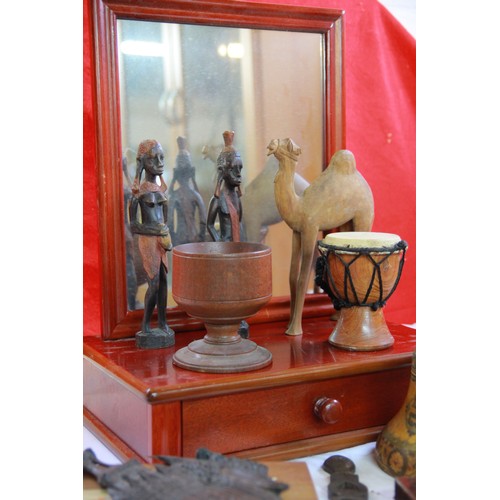 216 - An interesting assortment of treen items including a yew goblet, an intricately carved, bell-shaped ... 