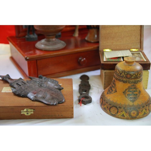 216 - An interesting assortment of treen items including a yew goblet, an intricately carved, bell-shaped ... 