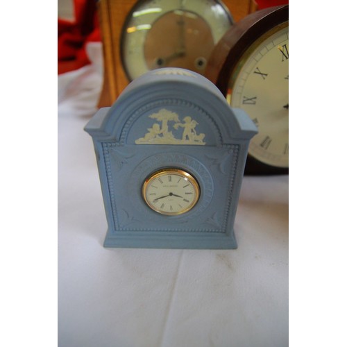 227 - An assortment of clocks including a Jasperware example, carriage clocks and others