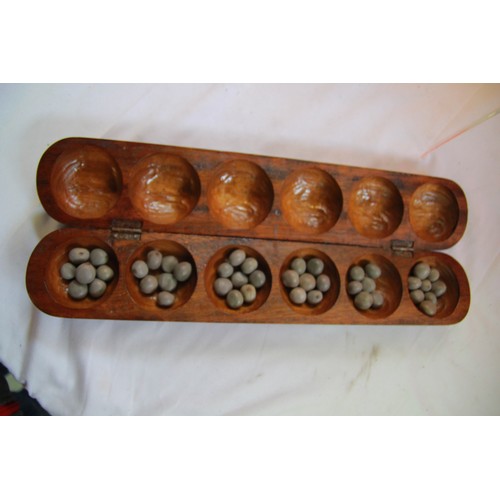 215 - Box of carved wooden items