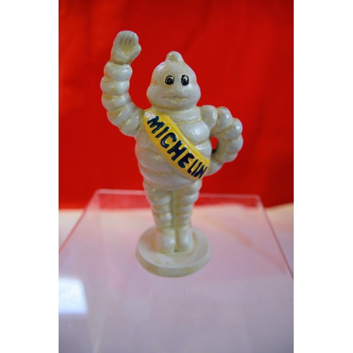 11 - A cast iron Michelin Man figure