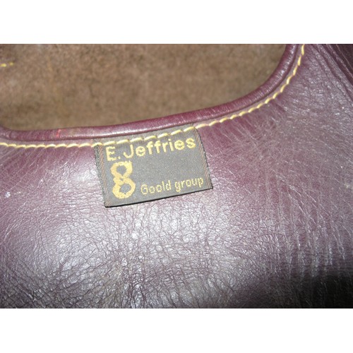 119 - A vintage leather shotgun cartridge bag by E Jeffries in good order