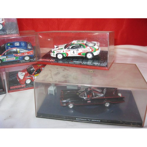 197 - An assortment of die-cast cars including WRC, some cased, a Batman car and a Hot Wheels car