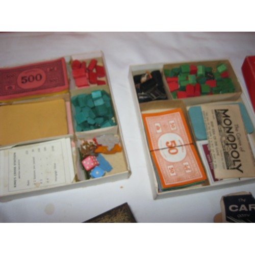 202 - A tray of games including multiple sets of vintage dominos, card games etc