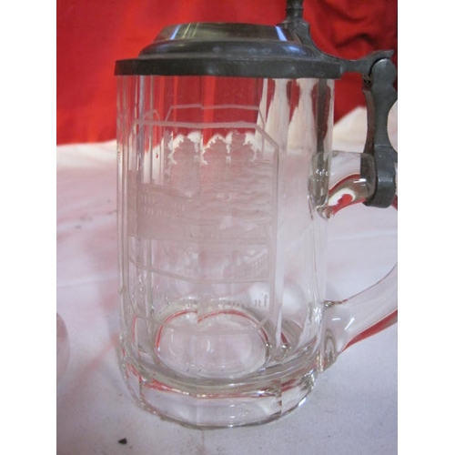 37A - A heavy vintage etched glass lidded tankard from Schloss Pyrmont in good order and a crystal glass s... 