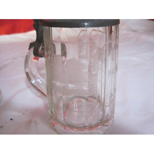 37A - A heavy vintage etched glass lidded tankard from Schloss Pyrmont in good order and a crystal glass s... 