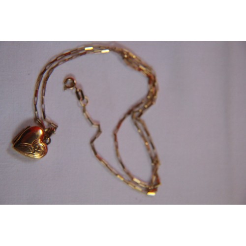 147 - A 9ct gold heart-shaped locket and chain, approximate weight 5g