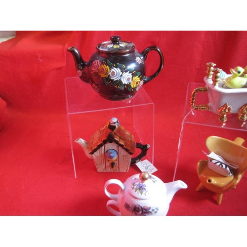 46 - A selection of teapots, including an embellished Sadler and some from the Tea Pottery