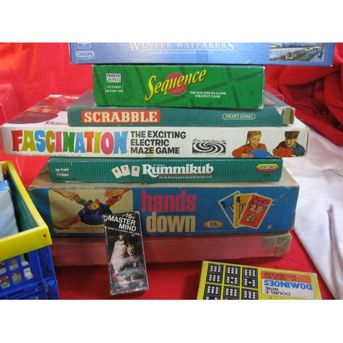 267 - A stack of vintage board and other games, all boxed, including Frustration, Hands Down,  Scrabble an... 