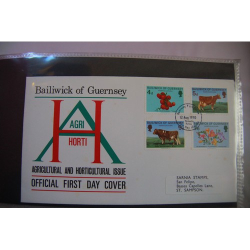 138 - A collection of 3 albums of Guernsey First Day Covers and several sheets of Guernsey stamps