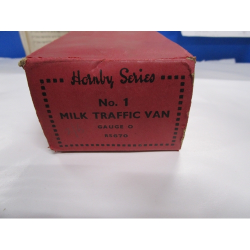 270 - A Hornby tinplate  O gauge boxed North Eastern milk traffic van in good condition for age despite ha... 