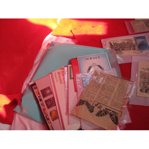 136 - A folder of postcards and other ephemera