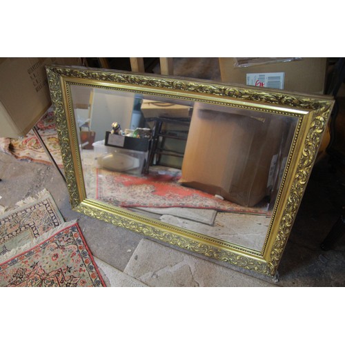 50 - Ornate, framed bevelled mirror