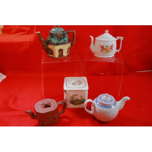 56 - Box of teapots including a post war Wedgwood square version