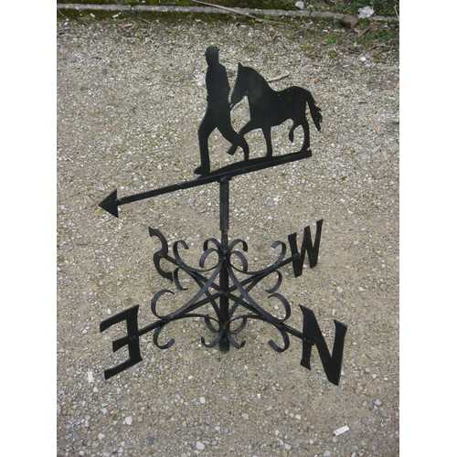 28 - Black painted weather vane of a Horse and handler.