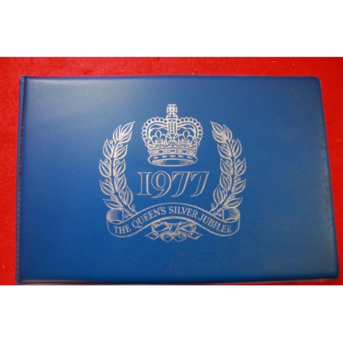 109 - A selection of stamp albums including a 1977 Silver Jubilee Album and various others including one a... 