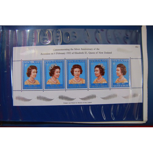 109 - A selection of stamp albums including a 1977 Silver Jubilee Album and various others including one a... 