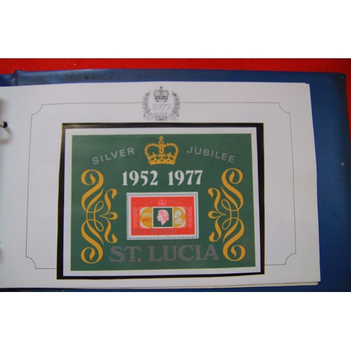 109 - A selection of stamp albums including a 1977 Silver Jubilee Album and various others including one a... 