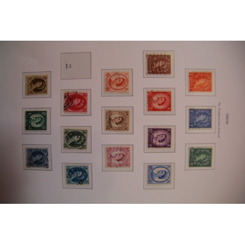 109 - A selection of stamp albums including a 1977 Silver Jubilee Album and various others including one a... 