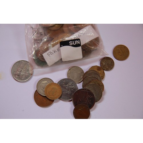 46 - A bag of foreign coinage