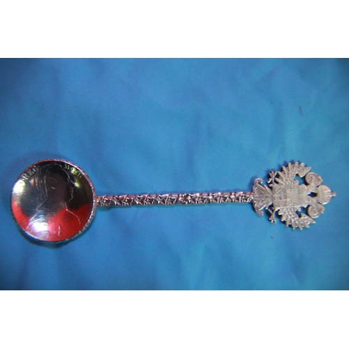 49 - A continental .800 silver decorative spoon with a coin bowl