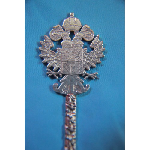 49 - A continental .800 silver decorative spoon with a coin bowl