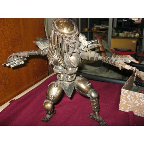 38 - A Predator figure made from engineering parts