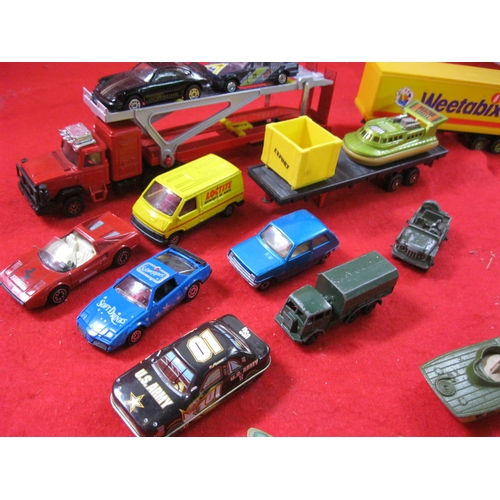 294 - A small box of die cast toy cars including a BenBros Qualitoy Austin Champ Jeep, the rest mainly con... 