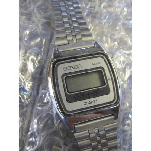 103 - 8 new old stock 'Saxon' digital LCD watches, in bulk packaging