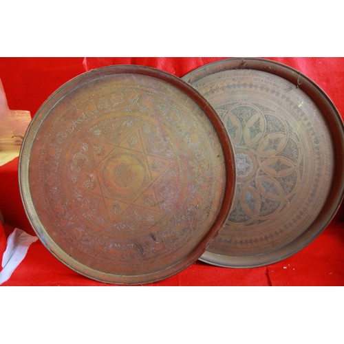 15 - A pair of Oriental large brass inscribed trays