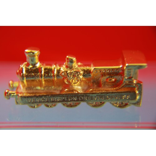 192 - Small gold-plated souvenir Venice Simplon Orient Express Paperweight
No box